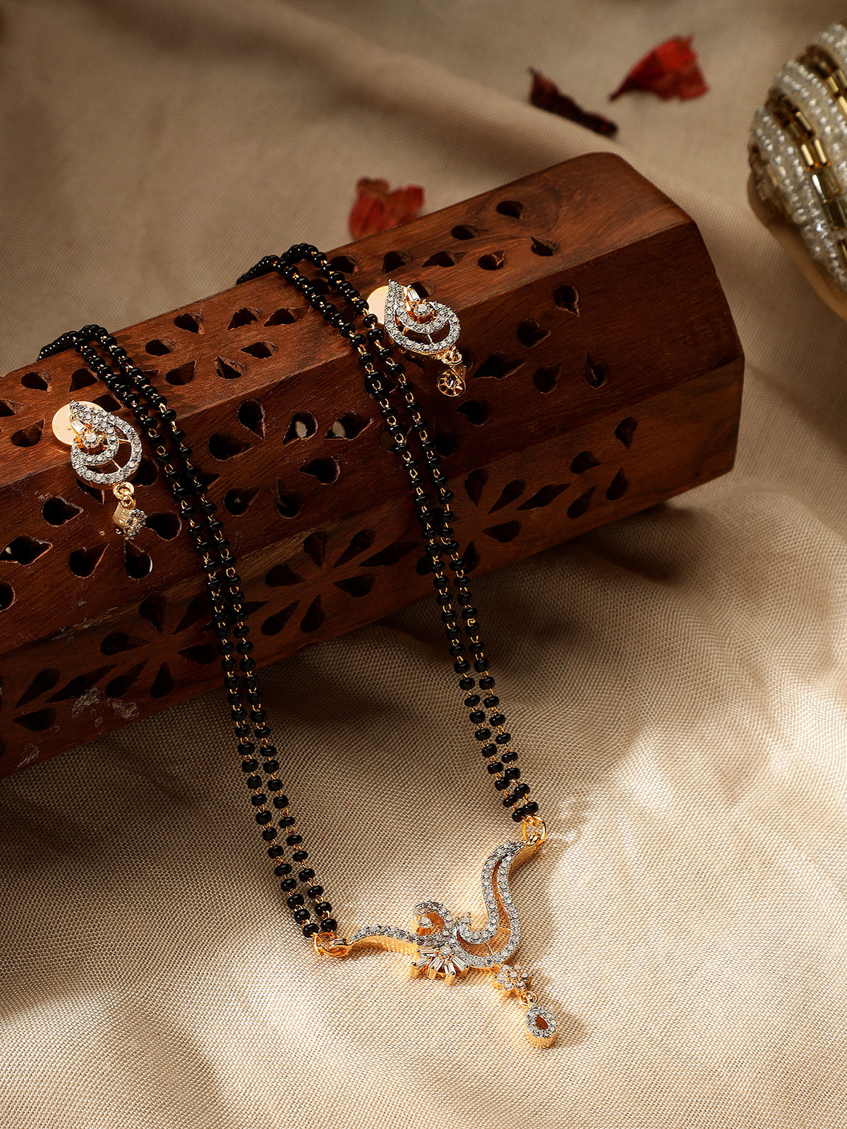 Exquisite Rhodium-Plated American Diamond Peacock Motif Mangalsutra & Earrings Set